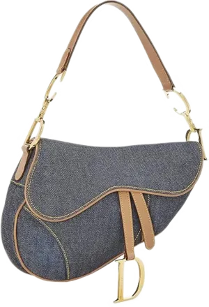 Dior Saddle bag in blue denim with tan leather trim and a D charm