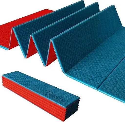 Folding exercise mats in teal and red, shown open and folded